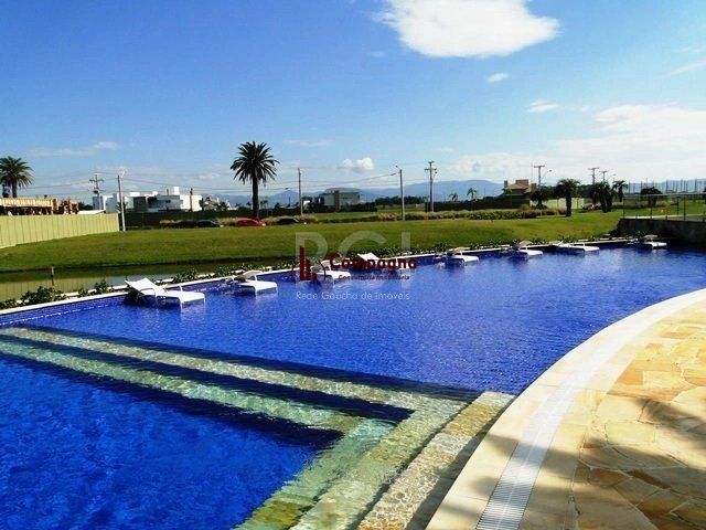 Excepcional sobrado 5 dormitórios com 5 suítes, totalmente mobiliado e ricamente decorado a beira lago em Xangrilá, no Condomínio Enseada. — foto 5