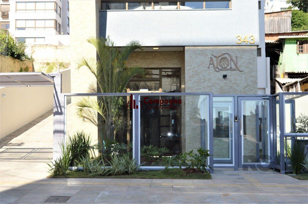 Lindo apartamento 2 dormitórios com 2 suítes, lavabo, vaga de garagem, amplo living 2 ambientes e cozinha com churrasqueira. — foto 4