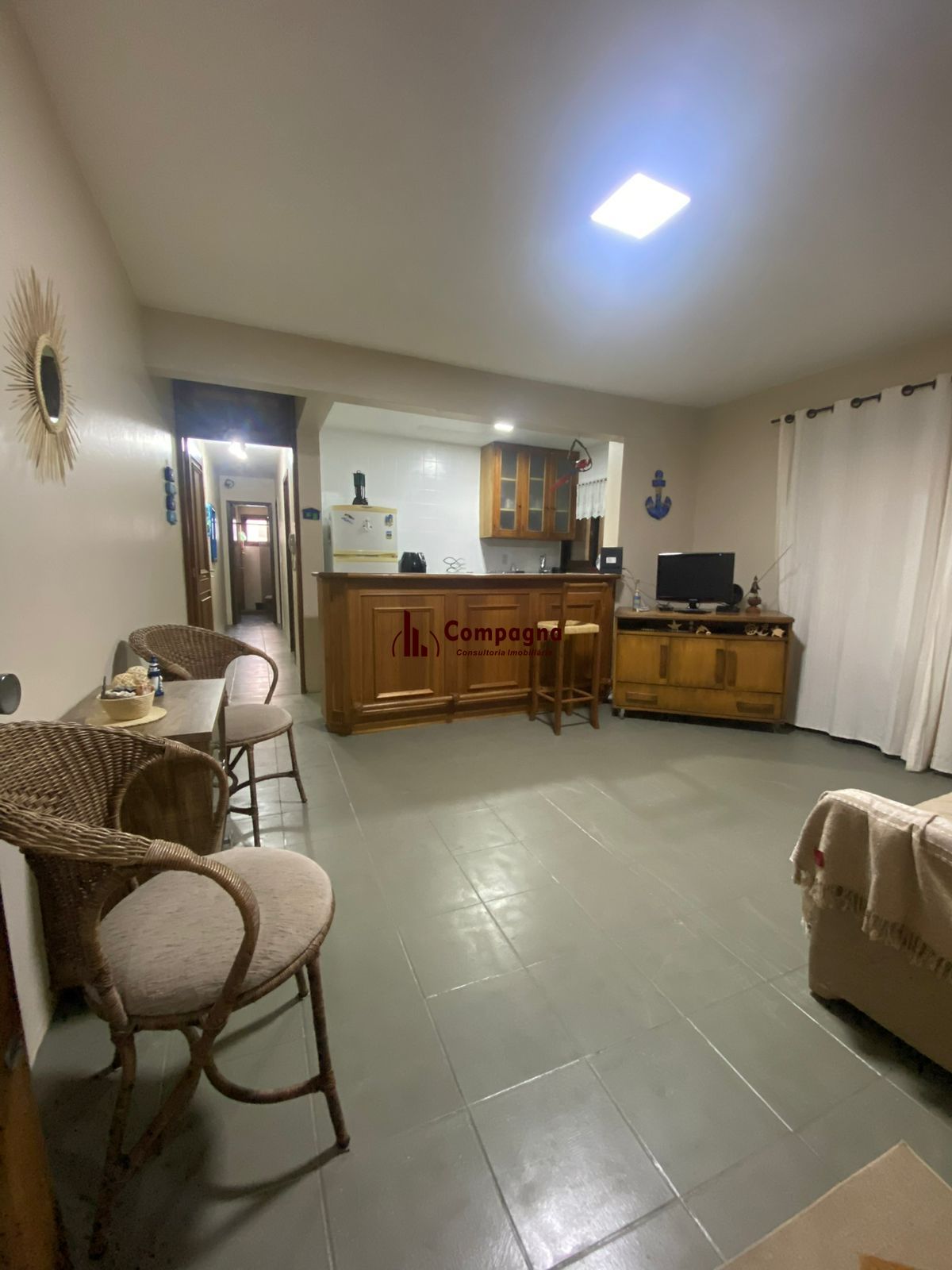 Apartamento com 2 dormitórios e garagem em Torres
