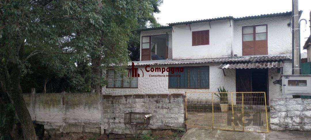 Casa 5 dormitórios, bairro Camaquã.