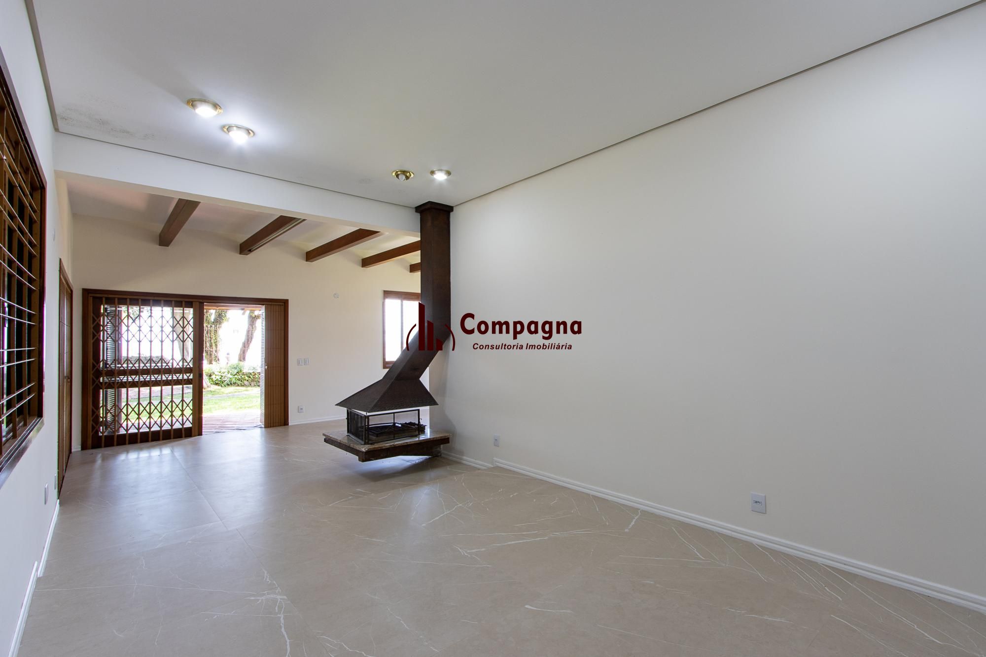 Casa com 2 dormitórios 3 banheiros. lareira e churrasqueira, e com arquitetura moderna. — foto 3