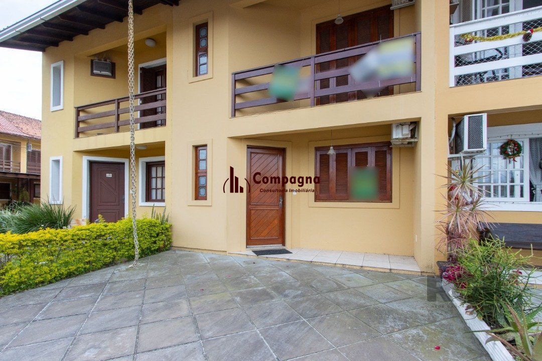Casa em Condomínio na Zona Sul, no bairro Hípica, com 2 dormitórios, living para dois ambientes, cozinha mobiliada, lavabo — foto 3