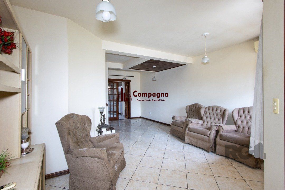 Casa em Condomínio na Zona Sul, no bairro Hípica, com 2 dormitórios, living para dois ambientes, cozinha mobiliada, lavabo — foto 5