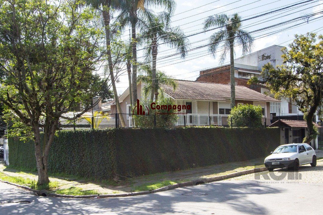 Casa a venda no bairro Guarujá com 4 dormitórios, piscina e salão de festas — foto 3