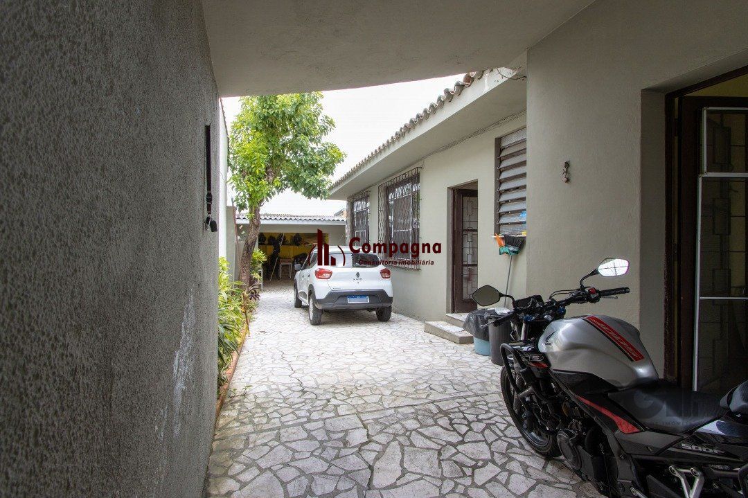 Casa térrea, 3 quartos, 2 banheiros, com pátio no Bairro Cavalhada — foto 3
