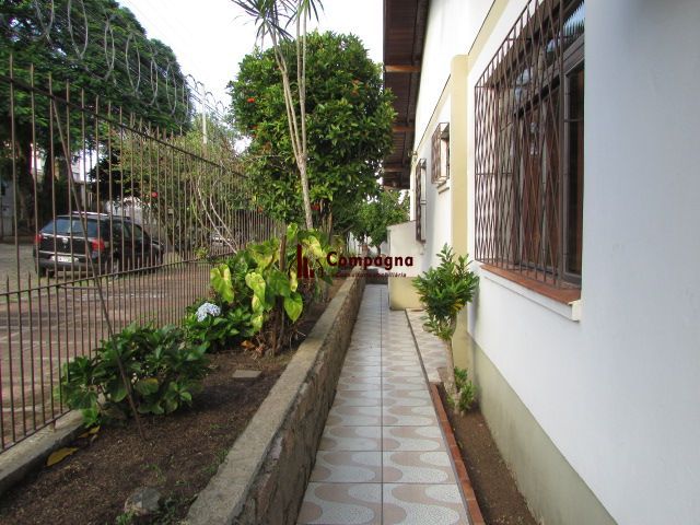 Casa térrea, com 3 dormitórios, 1 suíte, no bairro Nonoai. — foto 5