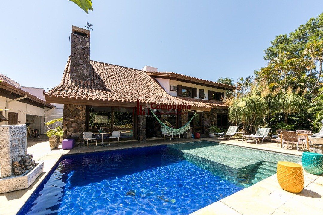 Casa para Venda - 370m², 5 dormitórios, sendo 2 suites, 7 vagas - Vila Assunção