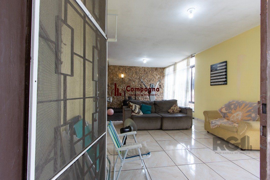 Casa térrea, 3 quartos, 2 banheiros, com pátio no Bairro Cavalhada — foto 4