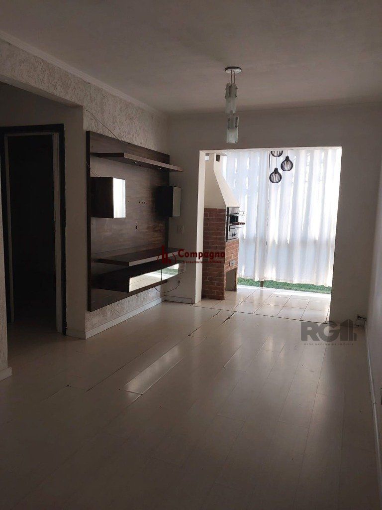 Vende-se apartamento 2 dorm com vaga, sacada com churrasqueira - 64m² - Partenon