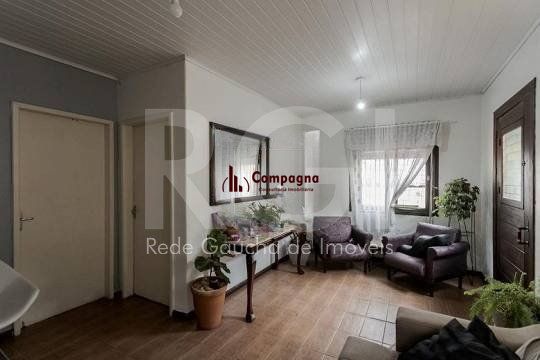 Casa composta por seis(6) dormitórios, no bairro Passo da Areia em Porto Alegre/RS. — foto 2