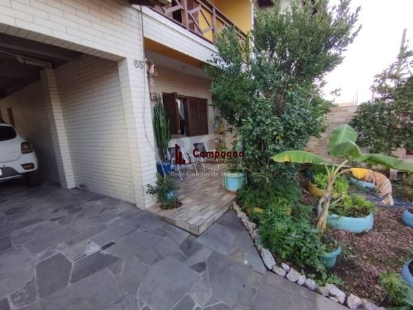 Casa em Porto Alegre, no bairro Hípica, com 3 dormitório(s), e 3 banheiros, à venda. — foto 3