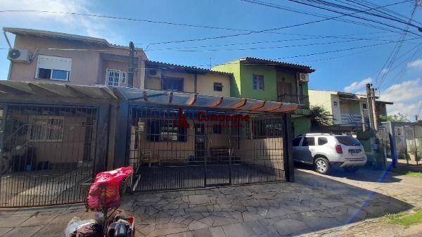 Casa em Porto Alegre, no bairro Hípica, com 3 dormitório(s), à venda. — foto 2