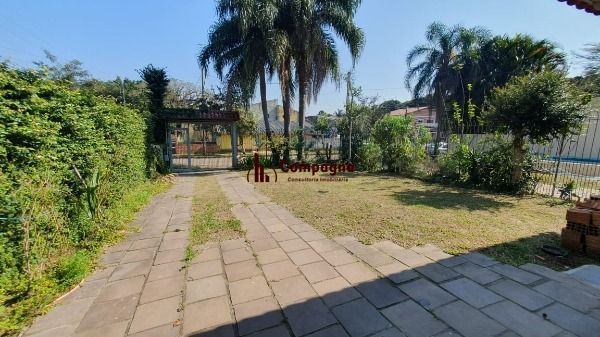Casa em Porto Alegre, no bairro Espírito Santo, com 4 dormitório(s), e 4 banheiros, à venda. — foto 2
