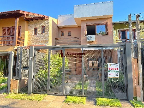 Casa em Porto Alegre, no bairro Hípica, com 3 dormitório(s), e 3 banheiros, à venda. — foto 2