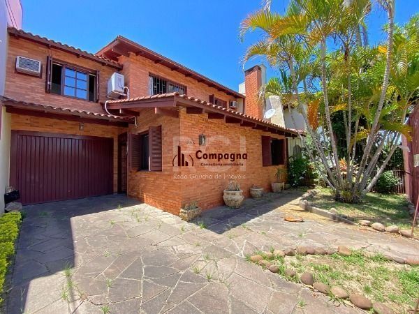 Casa em Porto Alegre, no bairro Ipanema, com 3 dormitório(s), e 3 banheiros, à venda. — foto 3
