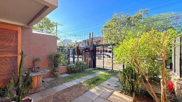 Casa em Porto Alegre, no bairro Hípica, com 3 dormitório(s), e 3 banheiros, à venda. — foto 3