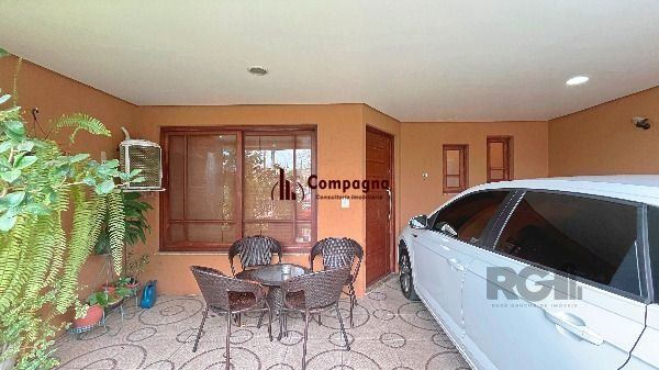 Casa em Porto Alegre, no bairro Hípica, com 3 dormitório(s), e 3 banheiros, à venda. — foto 3