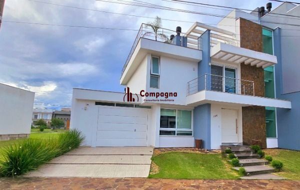 Casa em Porto Alegre, no bairro Hípica, com 3 dormitório(s), e 3 banheiros, à venda.