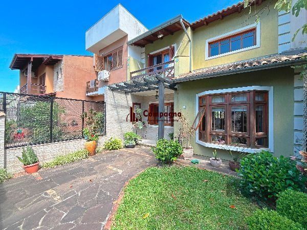 Casa em Porto Alegre, no bairro Hípica, com 3 dormitório(s), e 2 banheiros, à venda. — foto 2