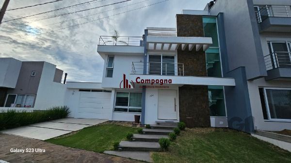 Casa em Porto Alegre, no bairro Hípica, com 3 dormitório(s), e 3 banheiros, à venda. — foto 2