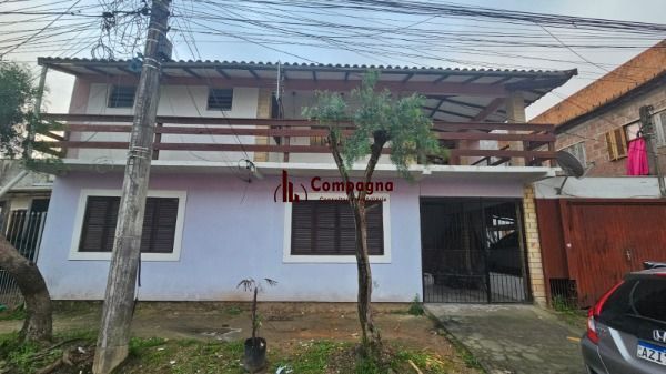 Casa em Porto Alegre, no bairro Hípica, à venda. — foto 2