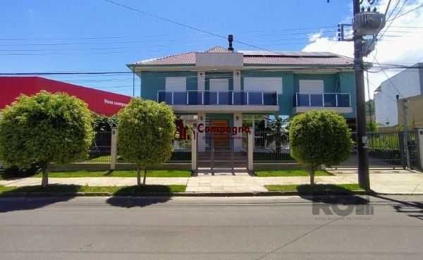 Casa em Porto Alegre, no bairro Hípica, com 3 dormitório(s), e 3 banheiros, à venda. — foto 2