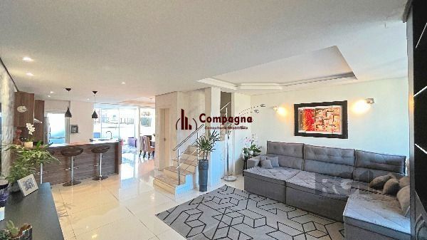 Casa em Porto Alegre, no bairro Hípica, com 3 dormitório(s), e 3 banheiros, à venda. — foto 4