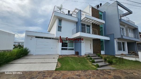 Casa em Porto Alegre, no bairro Hípica, com 3 dormitório(s), e 3 banheiros, à venda. — foto 3