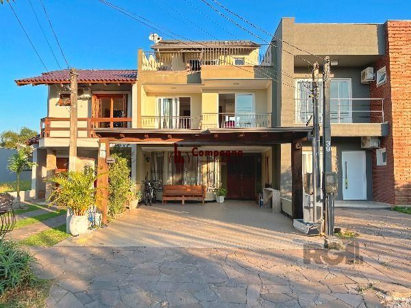 Casa em Porto Alegre, no bairro Hípica, com 3 dormitório(s), e 3 banheiros, à venda. — foto 2