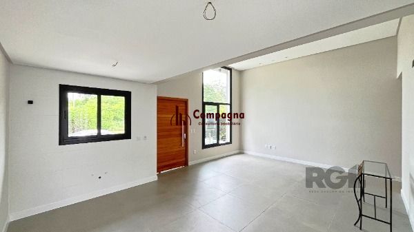 Casa em Porto Alegre, no bairro Hípica, com 3 dormitório(s), e 3 banheiros, à venda. — foto 5