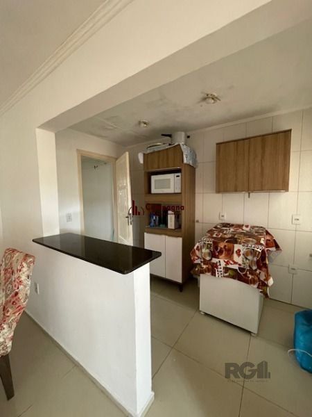 Casa em Porto Alegre, no bairro Hípica, com 2 dormitório(s), e 2 banheiros, à venda. — foto 4