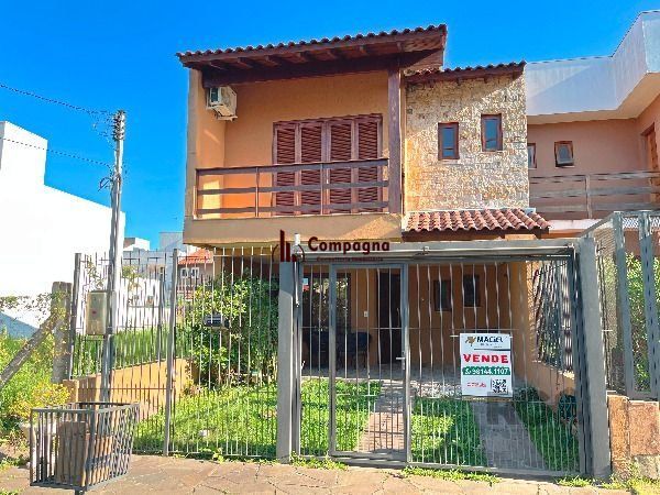 Casa em Porto Alegre, no bairro Hípica, com 3 dormitório(s), e 3 banheiros, à venda. — foto 2