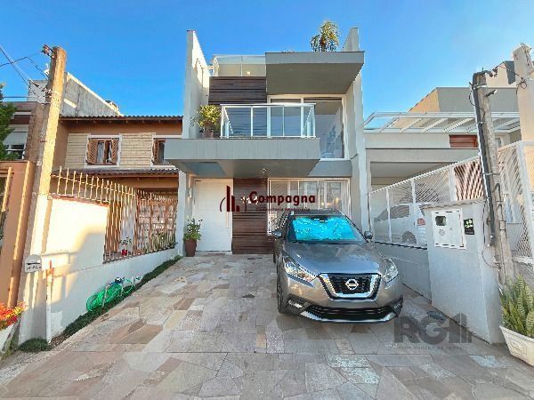 Casa em Porto Alegre, no bairro Hípica, com 3 dormitório(s), e 3 banheiros, à venda. — foto 3