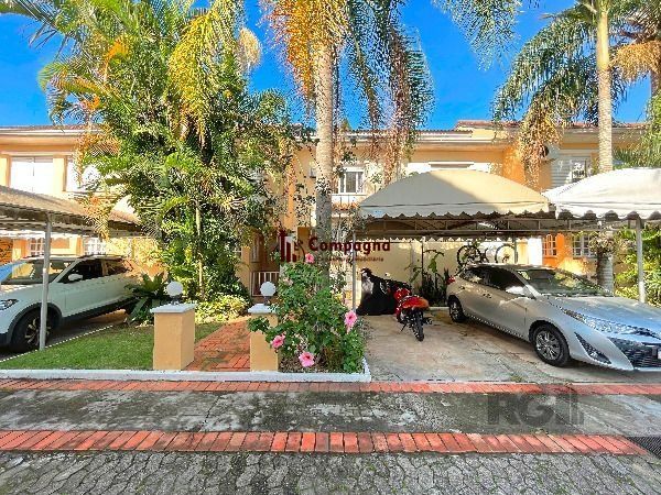 Casa Condominio em Porto Alegre, no bairro Tristeza, com 3 dormitório(s), e 3 banheiros, à venda. — foto 2
