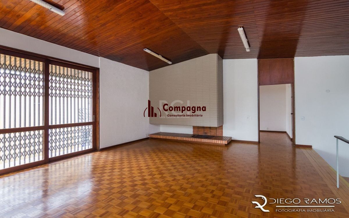 Venda de casa residencial 25,00m x 80,00m- Menino Deus. 4 vagas, 4 dormitórios, sendo 1 suíte, 1 varanda, lareira e churrasqueira. — foto 3
