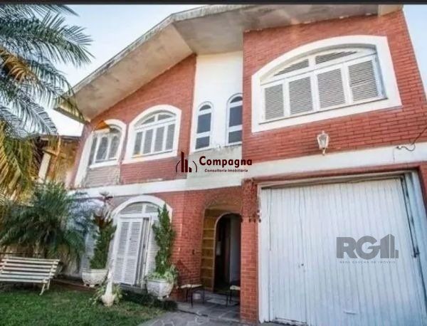 Casa sobrado no bairro Tristeza de 4 dormitórios 3 vagas