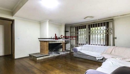 Casa sobrado no bairro Auxiliadora de 5 dormitórios e 4 vagas — foto 4