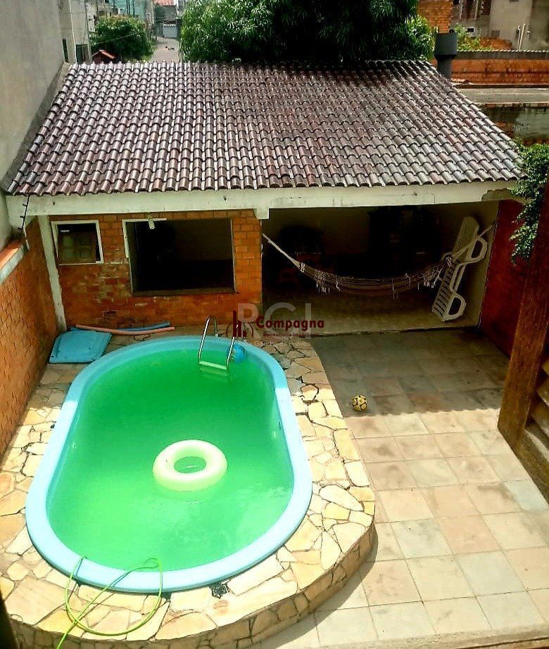 Casa  com piscina 3 dormitórios e 2 Costa e Silva Zona Norte de Porto Alegre