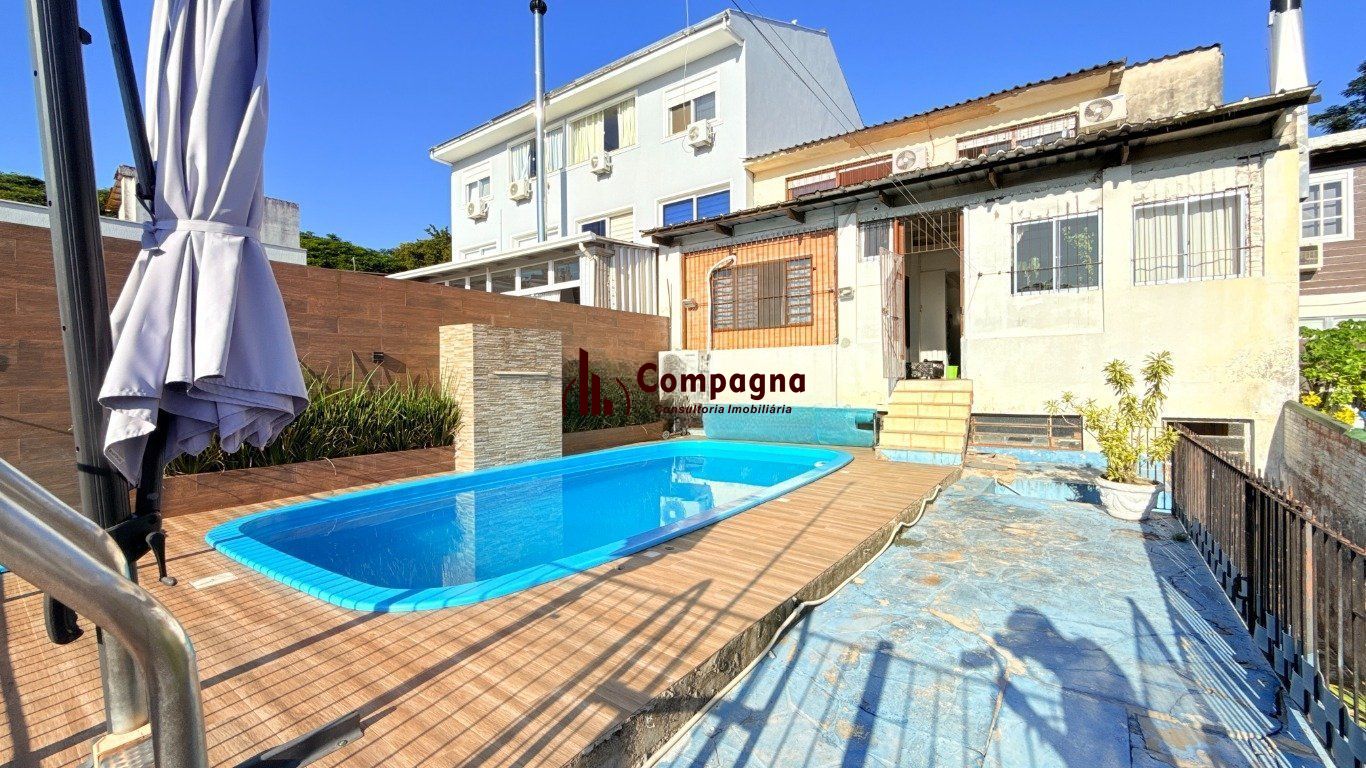 Casa com 4 quartos, vaga coberta, piscina e pátio no bairro Cristo Redentor — foto 3