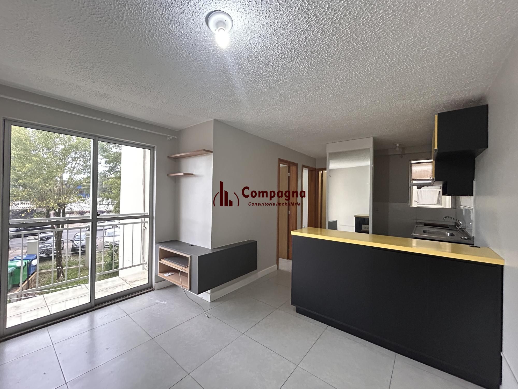 Apartamento 2 dormitórios com sacada e garagem | Condomínio com portaria 24h e lazer