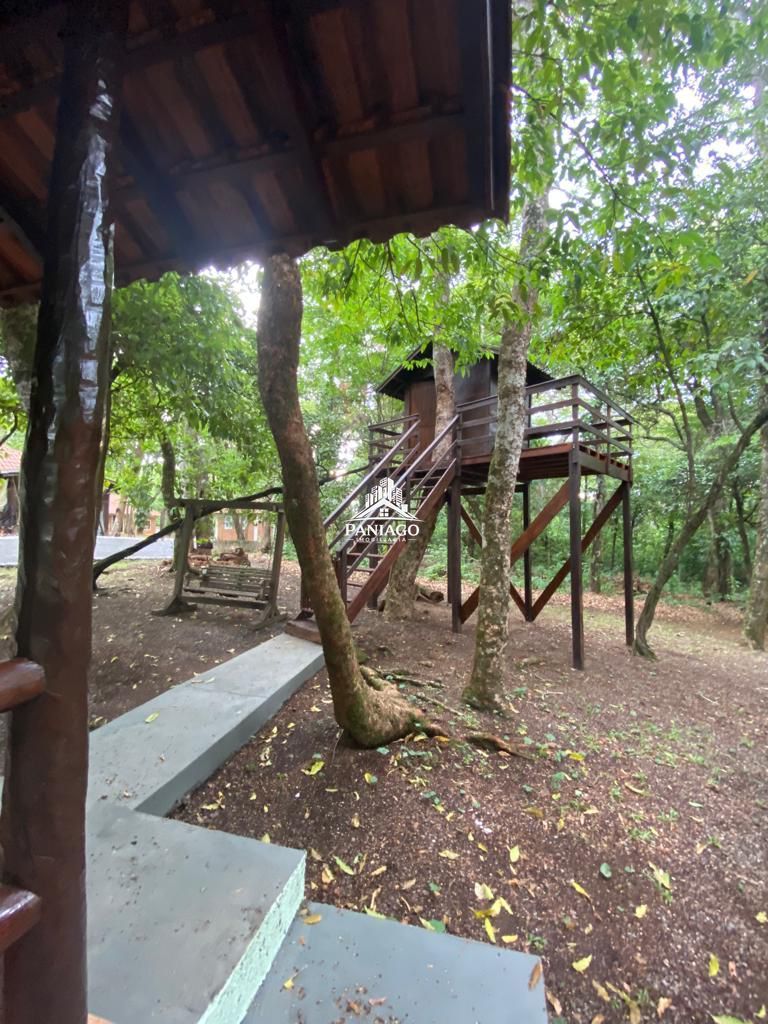 Casa com amplo terreno e potencial para pousada à venda em c