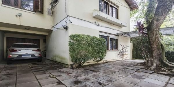 Casa sobrado no bairro Auxiliadora de 5 dormitórios e 4 vagas — foto 2