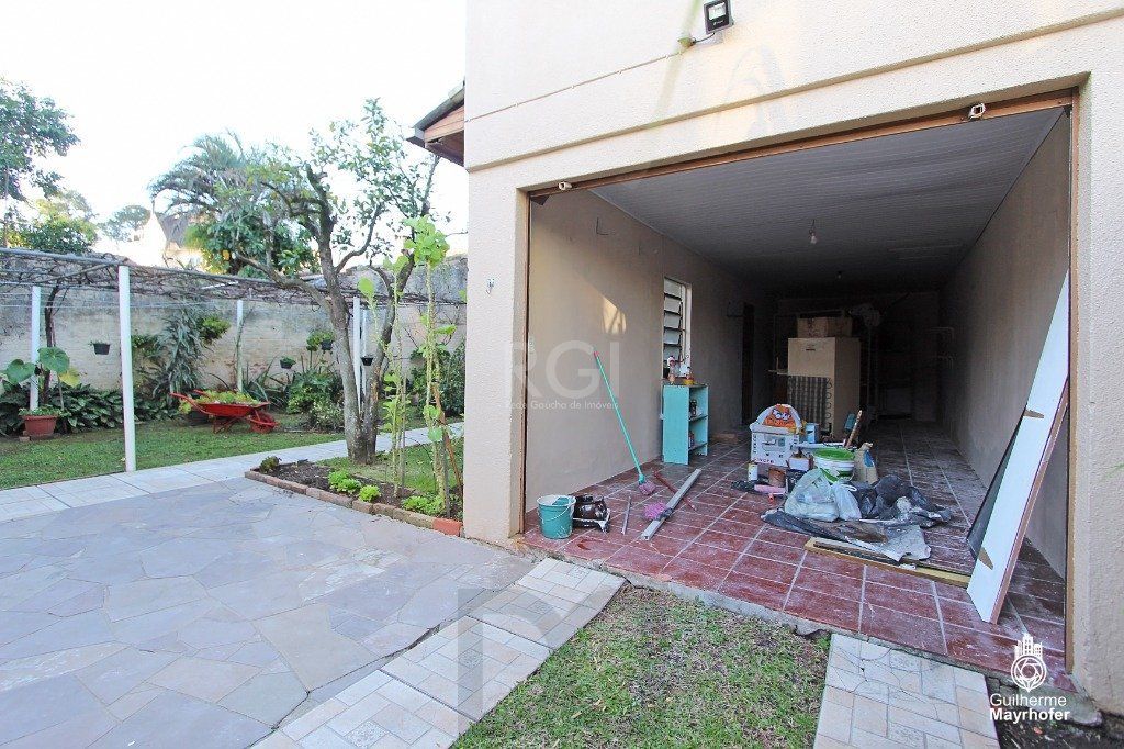 Casa no bairro Cavalhada de 3 dormitórios e amplo pátio — foto 34