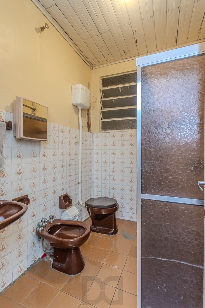 Casa no bairro Jardim Botânico de 3 dormitórios e garagem e terreno com 370m² — foto 16