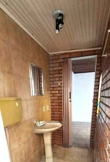 Apartamento de 2 dormitórios no bairro Teresópolis térreo com pátio DESOCUPADO — foto 10