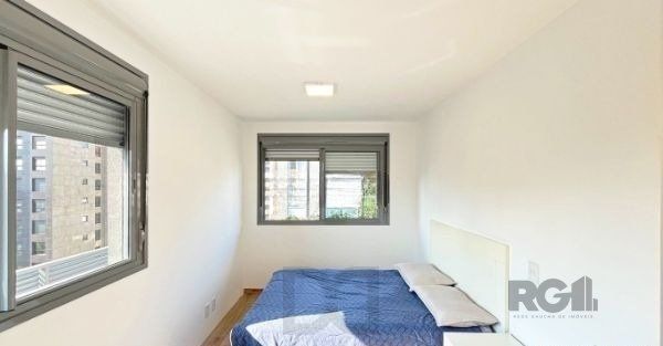 Apartamento no bairro Auxiliadora de 2 dormitórios vaga e infra DESOCUPADO — foto 18