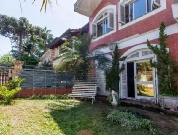 Casa sobrado no bairro Tristeza de 4 dormitórios 3 vagas DESOCUPADA — foto 1