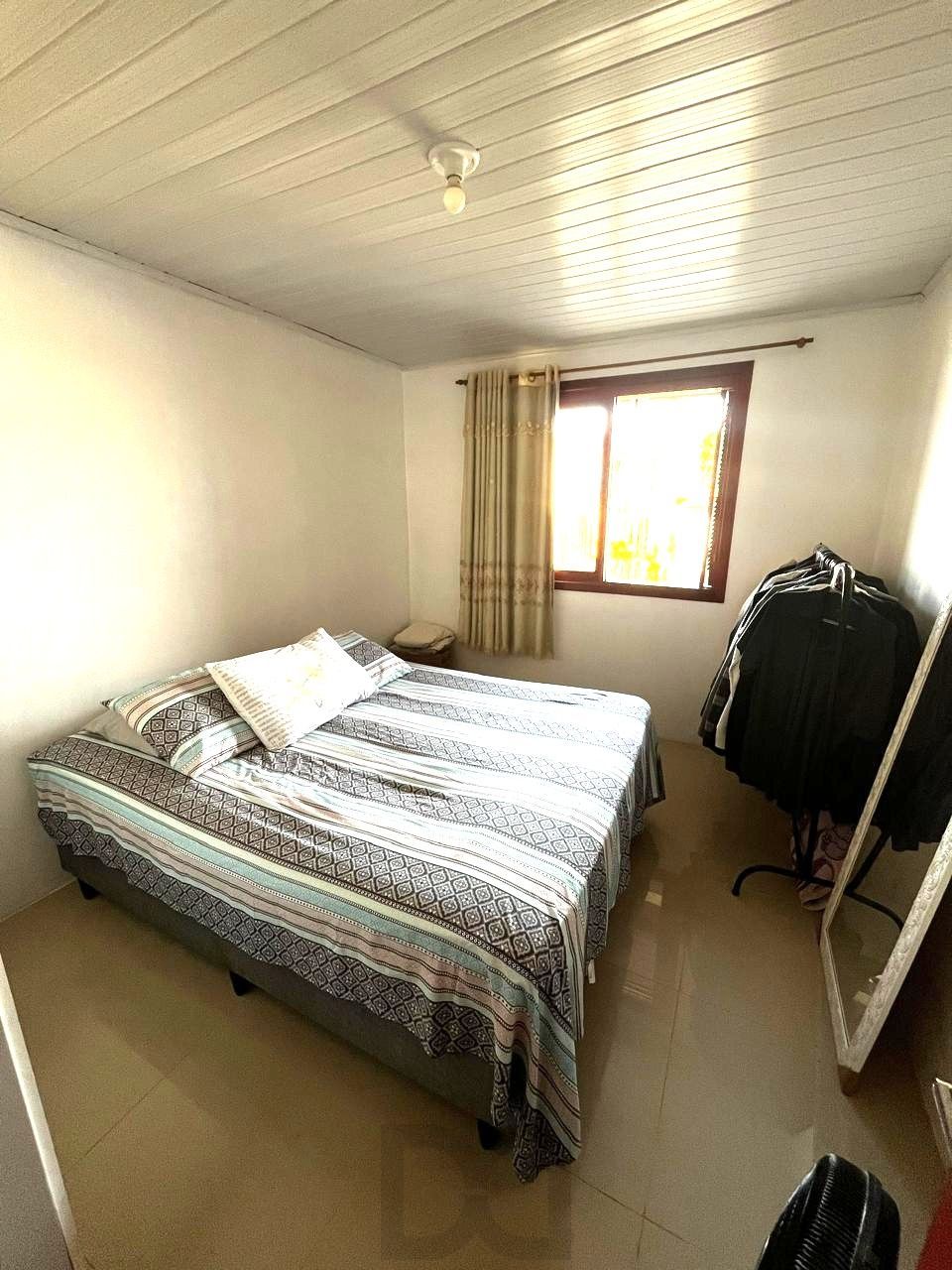 Casa térrea de 3 dormitórios e amplo pátio — foto 12