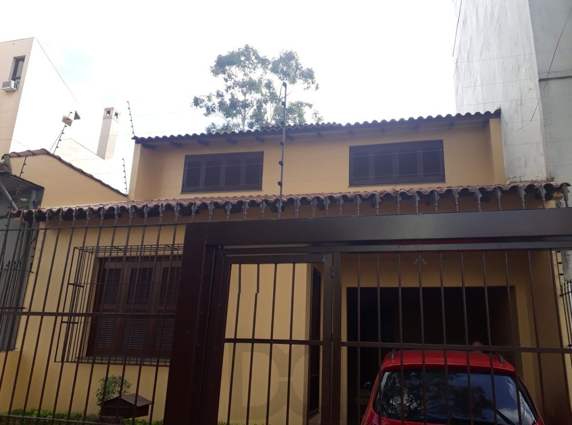 Casa sobrado no bairro Auxiliadora de 3 dormitórios e 3 vagas — foto 1
