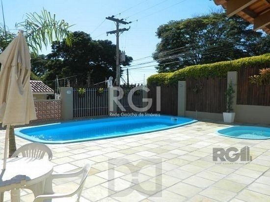 Casa em condomínio no Partenon de 3 dormitórios e vaga — foto 1